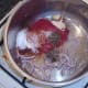 Ketchup and spices are added to softened onion