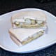 Spicy omelette and chip butty is plated to serve