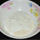 Put the upma rava, yogurt/curds, water, and salt in a mixing bowl. Mix well.