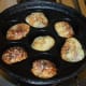 Remove them once both the sides are roasted. Repeat the same process to make the rest of the paddus.