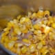 Step seven: Transfer the contents to a mixer or blender. Make a smooth paste. Add water if needed. Pour it back to the pan.