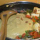 Step seven: Add paneer cubes. Add sugar and remaining salt. Stir well.