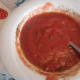 Tomato sauce with fresh and dry basil and oregano.