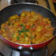 Step eight: Now, your favorite vegan knol-khol tomato gravy curry is ready! Garnish it with finely chopped coriander leaves. This side dish has semi-solid consistency.