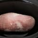 Place thawed turkey roast in crock pot.