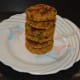 Enjoy eating hot, crunchy, and mouthwatering vegetable cakes with chickpeas accompanied with tomato sauce or yogurt dip.