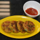 Serve hot fritters with tomato sauce or yogurt dip.