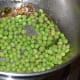 Step three: Throw in fresh peas. Add some salt. Saute for 3 minutes.