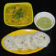 Serve 3-4 rava idlis in a plate with a spicy chutney. I served them with a vegetable sagu and a spicy chutney.