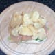 Crisps are arranged on smoked salmon