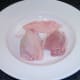 Skin peels easily from chicken thighs
