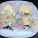 Crisps arranged over ham and blue cheese salad