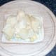 Crisps arranged on top of egg