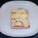 Cheese melted over tomato and onion