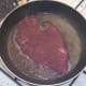 Starting to fry spiced steak