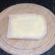 Butter is spread on bread