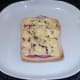 Cracked black pepper seasons cheese