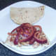 Spiced onions are spooned on to chicken