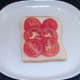 Tomato slices laid on bread