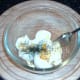 Mashing eggs, butter and seasoning