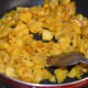 Cook till they become soft and turn golden yellow. Turn off the heat.