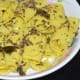 The tempering poured over the khandvi.