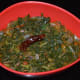 The curry is ready to serve. Eat it with flatbreads, roti, or chapati. Enjoy the taste!