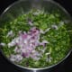 Step two: Add chopped fenugreek leaf and chopped onions to the batter. Mix well.