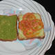 Step four: Keep a layer of thinly sliced cucumber on any of the bread slices. Next, another layer of thin slices of tomato.