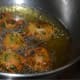 Step three: Drop a teaspoon full of the batter into the hot oil. Make 6-8 fritters in a batch.