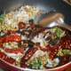 Step two: Add grated coconut and tamarind