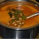 Step eight: Pour it on the rasam.