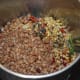 Step four: Grind spice mix, some cooked horse gram, and tamarind, adding water little by little to get a smooth paste.