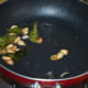 Step seven: Make a garlic tempering as per instructions.