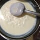 Step six: Add milk. Combine the flour and milk by stirring continuously. Bring it to a boil. Simmer for a minute.