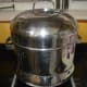 Cooking huruli kadubu in a steamer. Alternatively, you can use pressure cooker for this purpose. Don't place the cooker weight.