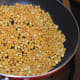 Step one: Roast split chickpea till golden brown. Transfer it to a large bowl.