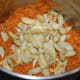 Step five: Add sauteed garlic. Grind or pulse till garlic gets crushed completely and blends with the other ingredients.