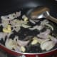Step two: Saute garlic, onions, cinnamon, and cloves in butter or oil. Continue sauteing till onions and garlic get golden brown on the edges.