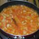 Step five: Add some water to keep it wet, so that the veggies blend nicely with the spices. Turn off the heat.