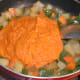 Step seven: Add gravy sauce to the pan. Stir-cook for 2 minutes.