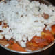 Step five: Add grated coconut. Grind the contents, adding enough water to get a smooth sauce.