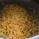 Step two: Add washed split pigeon pea(toor dal) to the pressure cooker.