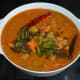 Step seven: Now, transfer the sambar to a serving dish. Add tempering as per instructions. Mix well while serving. Enjoy eating this spicy sambar with rice, dosa, or idli. You can serve this as a side dish for any type of vegetarian main course.