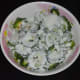 Step one: Immerse bitter gourd slices in curd and salt mixture.