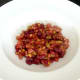 Bean salad is spooned in to serving plates