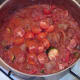 Halved cherry tomatoes are added to stew half way through cooking