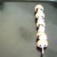 Mushroom and onion skewer ready for grilling