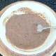Spicy sauce ingredients are stirred together