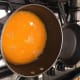 Heat the juice in a saucepan.
